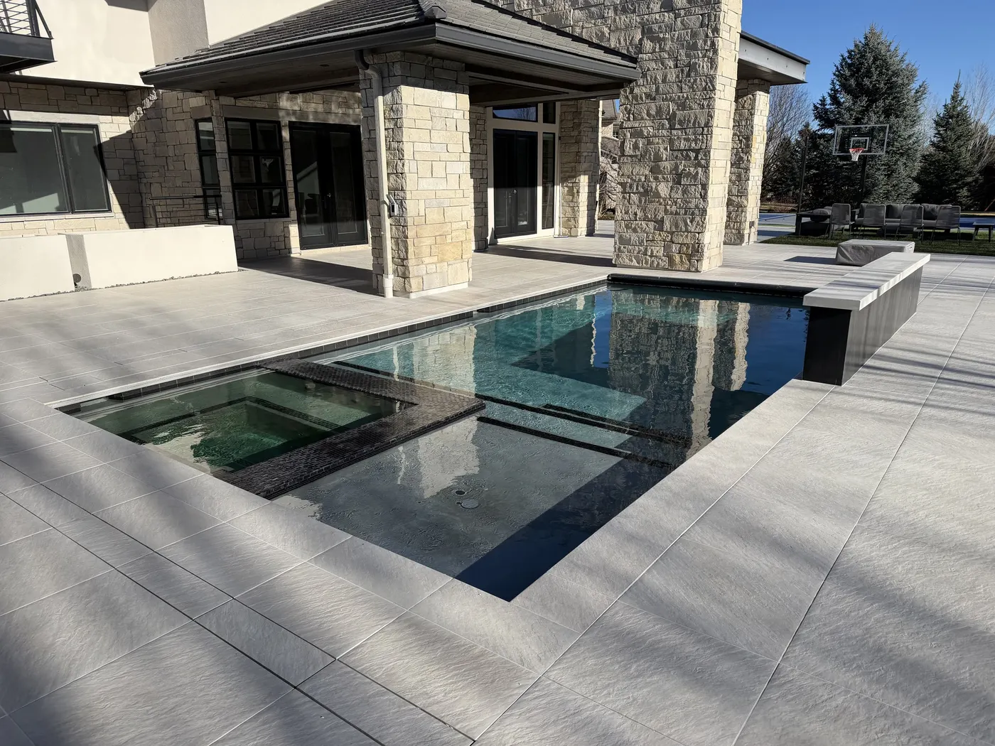 Terrace paving meeting a level lawn