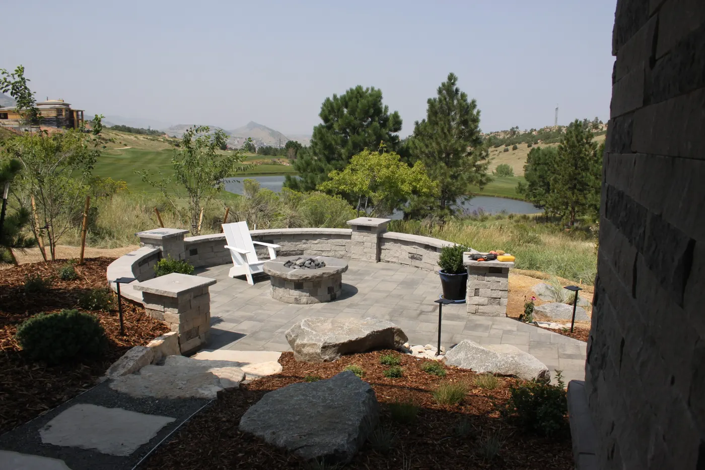 Fire feature and seating overlooking open ground