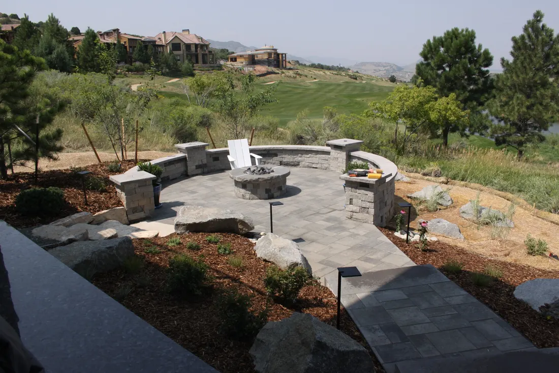 Terrace paving, boulders and native planting