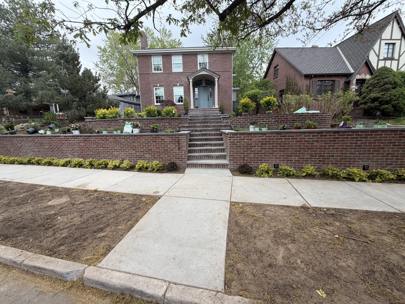 New brick terraces before planting, showing the structure beneath